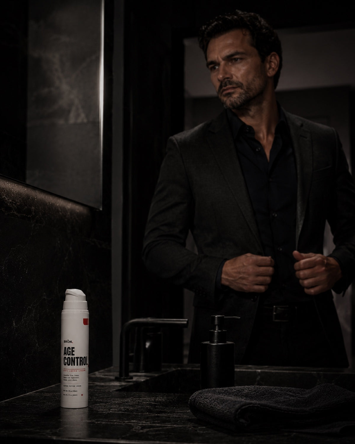 Man leaving the bathroom, bottle on the counter