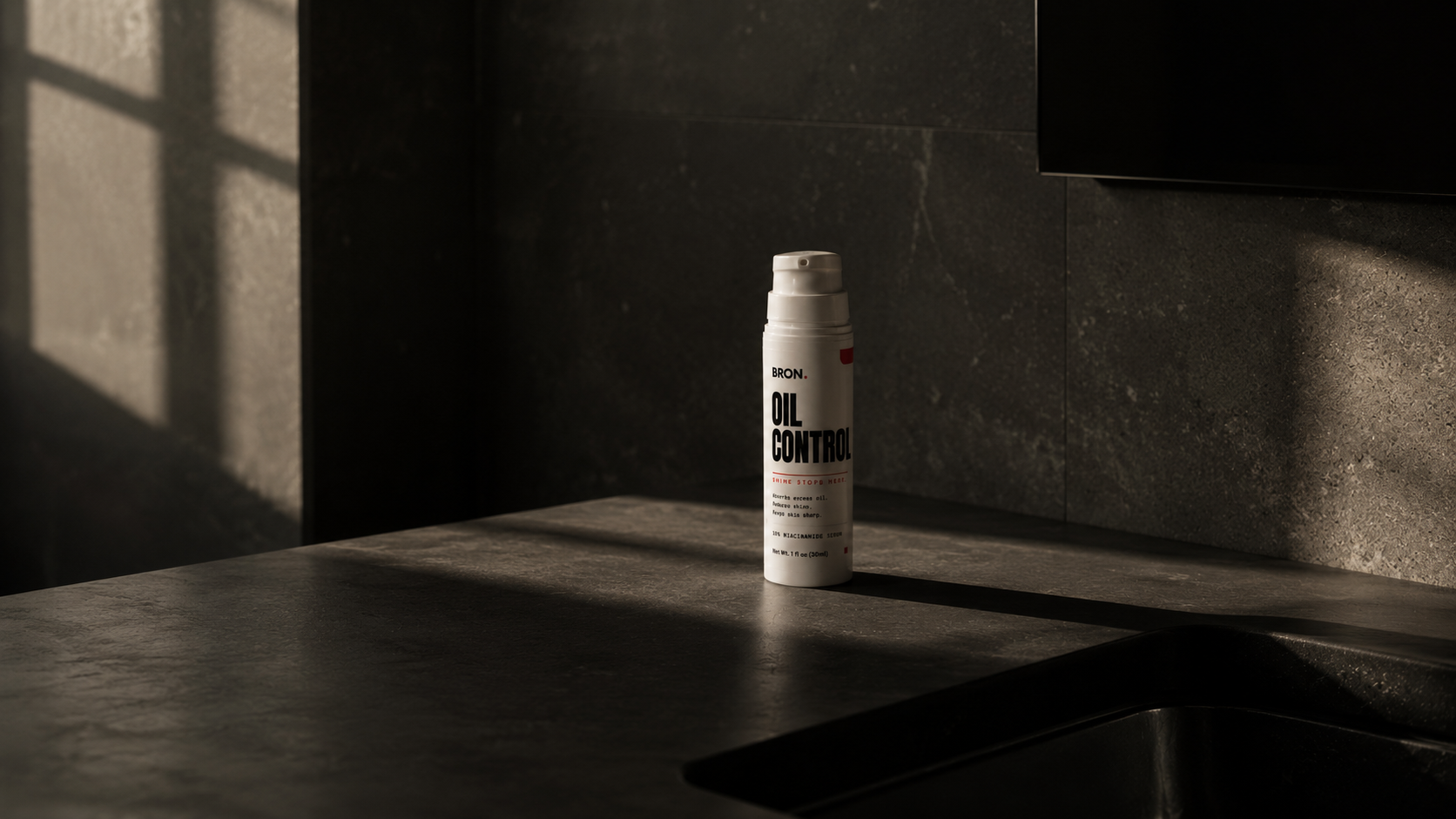 Minimal counter, empty except one BRON Oil Control bottle