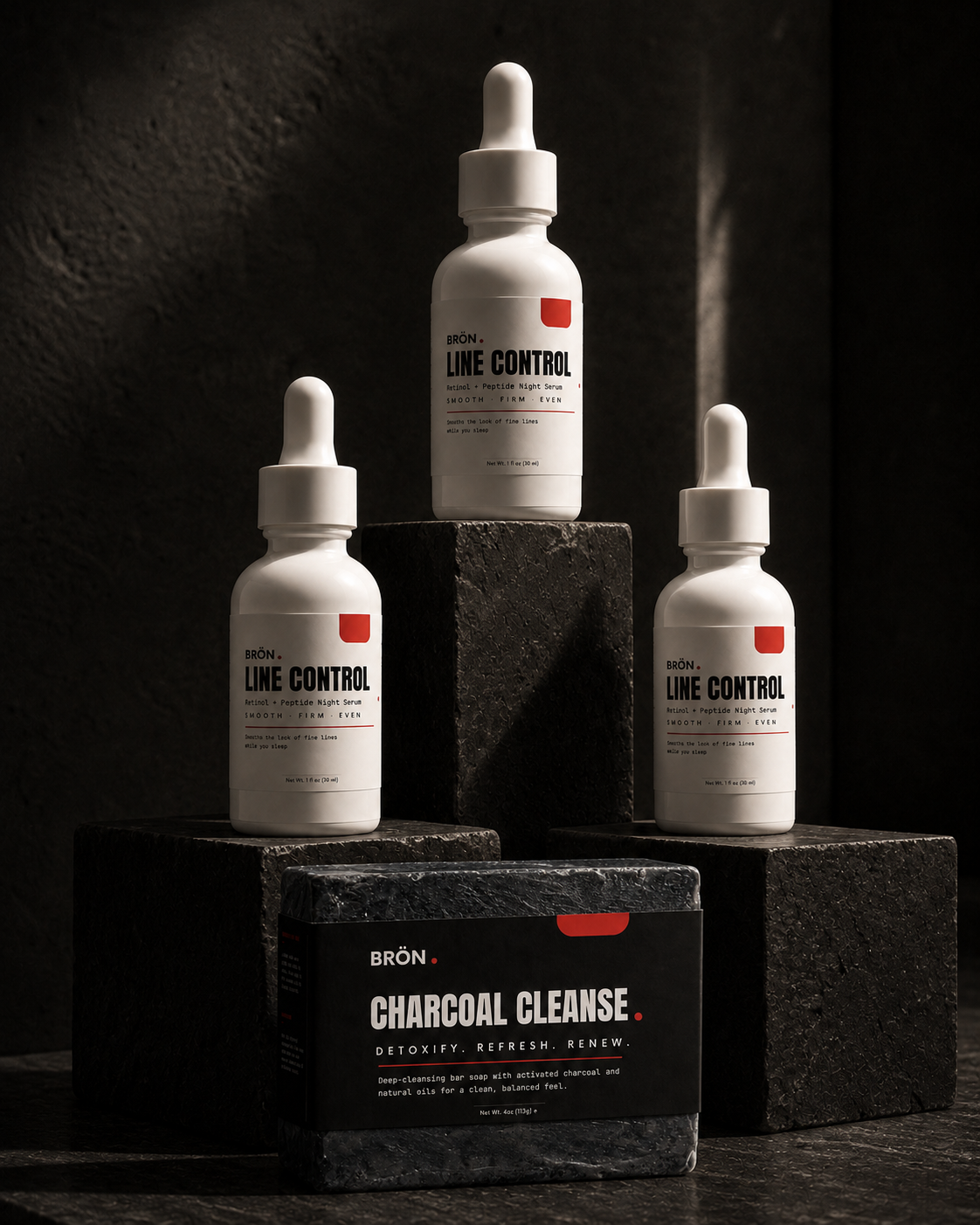 Three LINE CONTROL bottles and one Charcoal Cleanse Soap bar