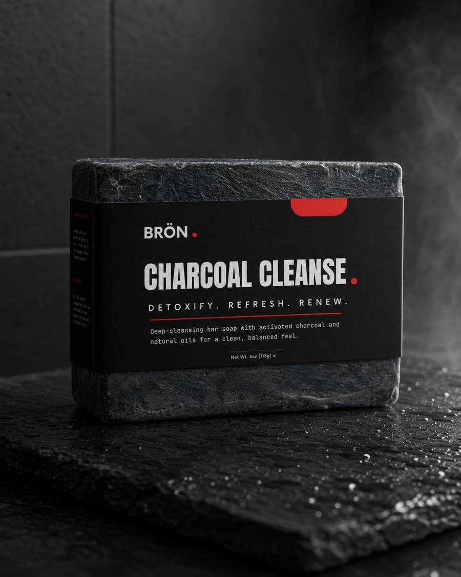 BRON Charcoal Cleanse Soap bar on wet dark slate